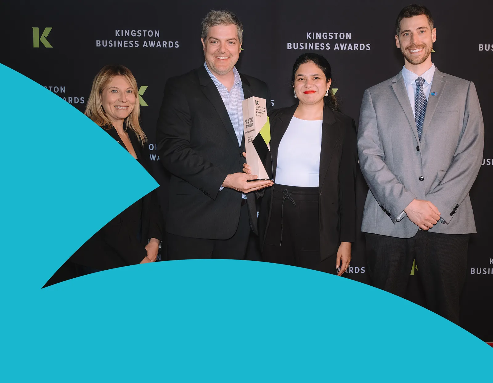 DoorStep Dental team receiving the 2026 New Business of the Year Award at the Kingston Business Awards, featured by the Ontario Chamber of Commerce for mobile dental hygiene and preventative oral healthcare in Ontario
